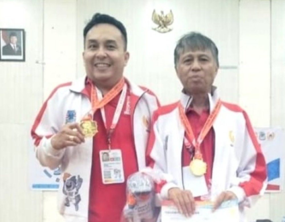 Mario Mambu–Franky Umboh Raih Emas untuk Manado di Porprov